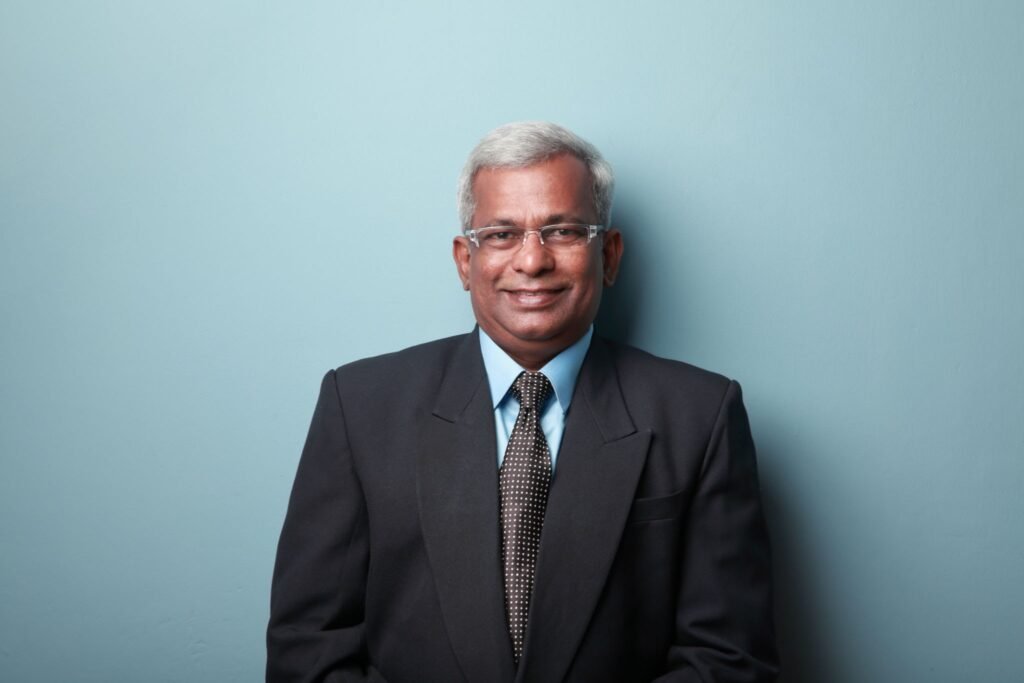 portrait of a smiling business man of indian ethnicity